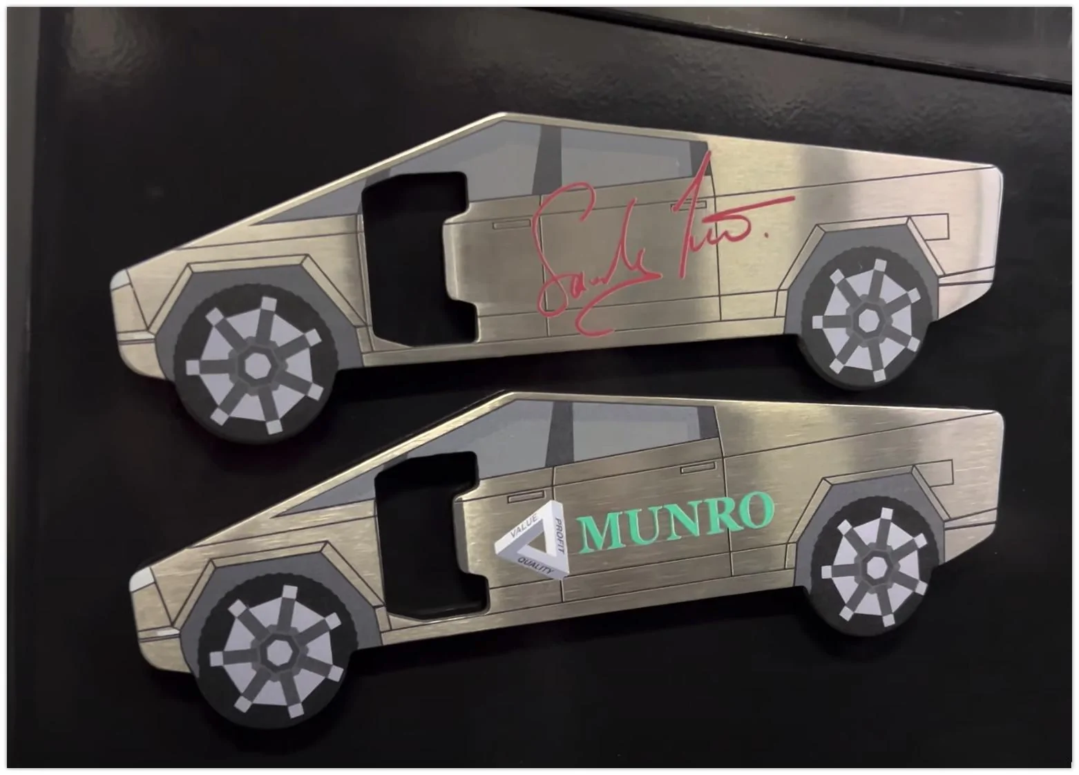 Tesla Model 2 Sandy Munro bottle openers for sale / donation Contribute to the Cybertruck Teardown With Our New Bottle Openers! - YouTube ? 2023-09-19 11-