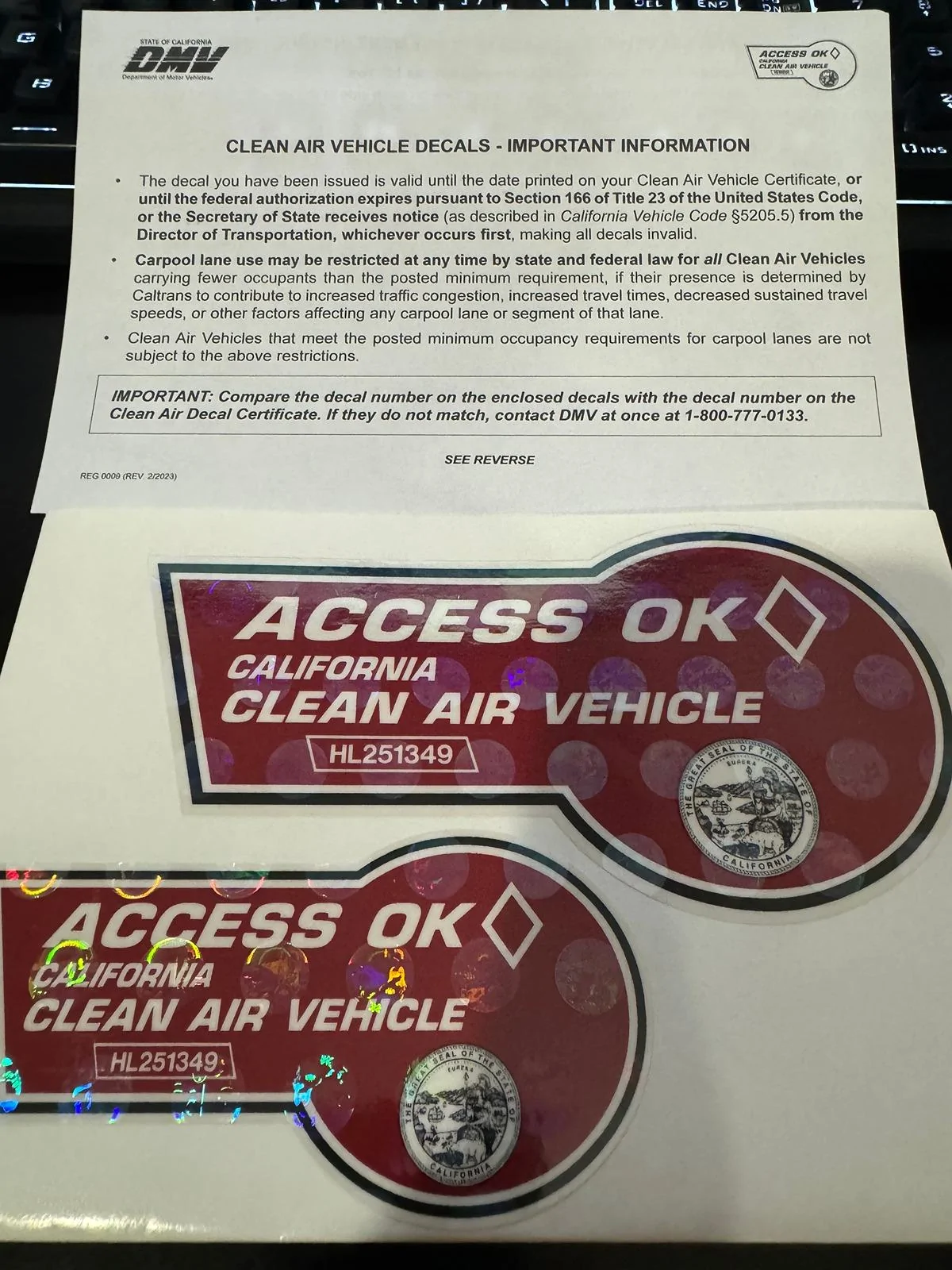 Tesla Model 2 CA HOV sticker application IMG_6827