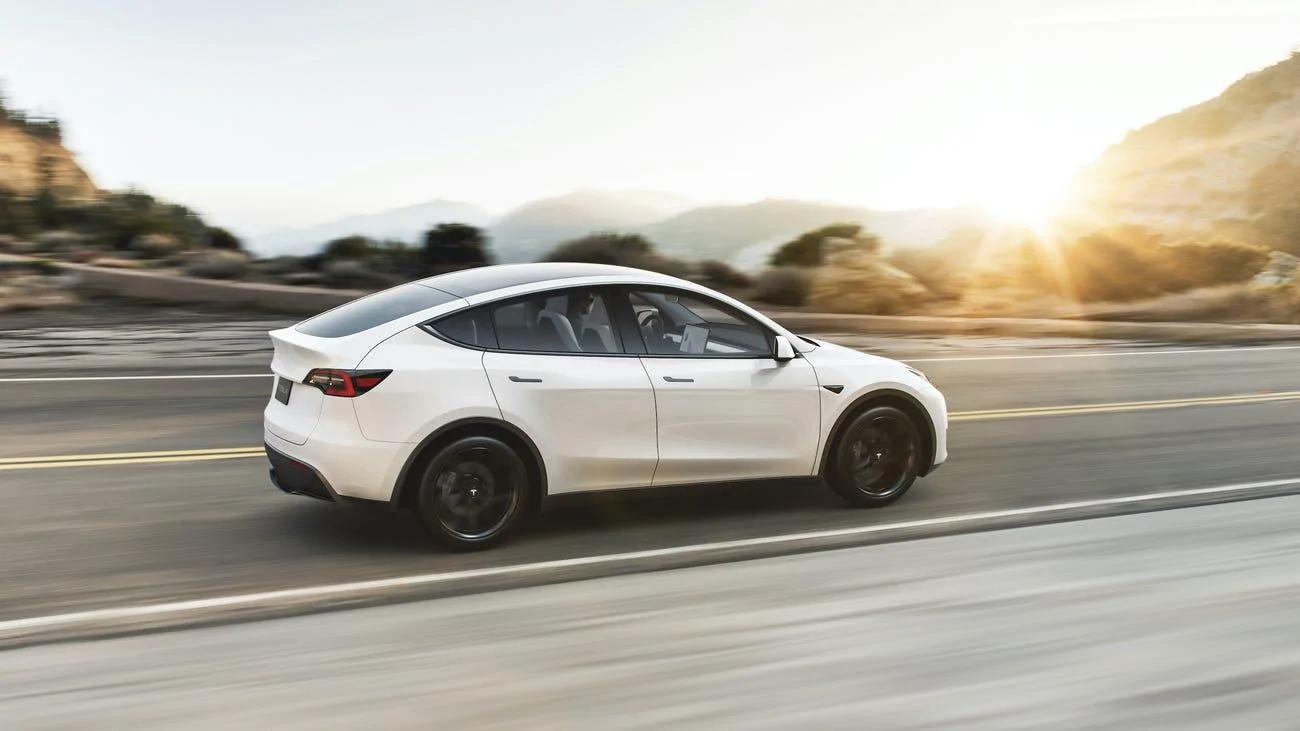 Tesla Model 2 Tesla just hiked prices by up to $10,000 — here's how much each model will set you back fef332b0028c118db?width=1300&format=jpeg&auto=