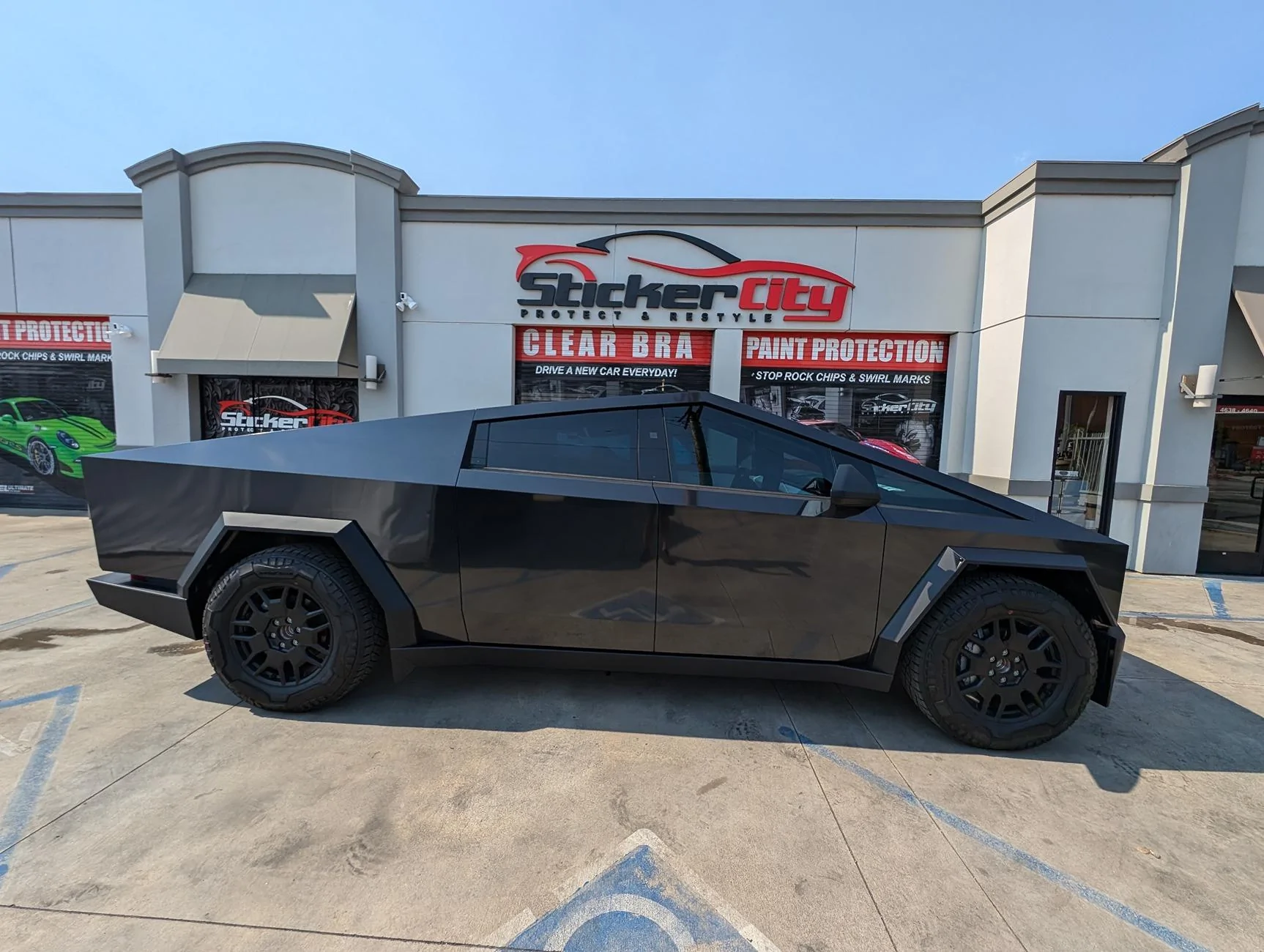 Tesla Model 2 Stickercity Offers $300 Discount for Cybertruck Colored PPF Wrap in Los Angeles LA Cybertruck wraps paint protection film ppf vinyl color change satin black liquid silver stick